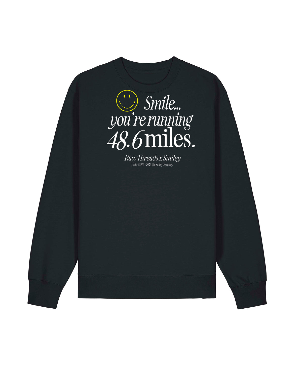 A gender-neutral oversized sweatershirt  in black with a white and yellow graphic on the front that reads 'Smile you're running 48.6 miles.' Raw Threads x Smiley logos.