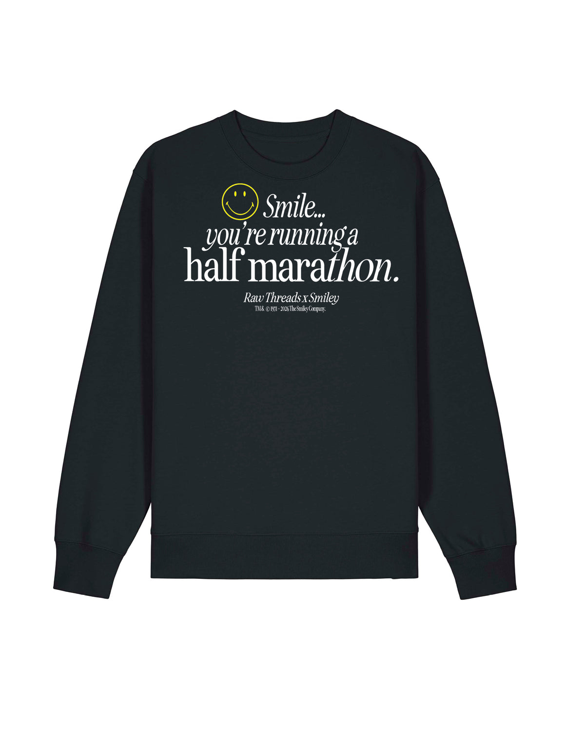 A gender-neutral oversized sweatshirt in black with a white and yellow graphic on the front that reads 'Smile you're running a half marathon.' Raw Threads x Smiley logos.