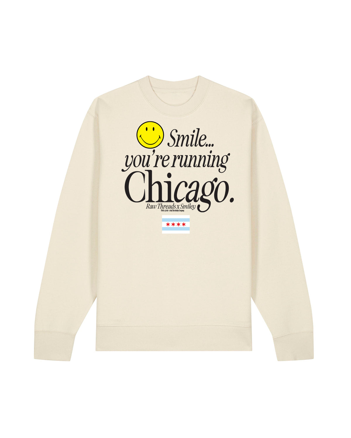 A natural tan gender-neutral crewneck sweatshirt featuring a graphic print on the front with a yellow smiley face and the text 'Smile you're running Chicago' including the Chicago flag and the Raw Threads x Smiley logo.