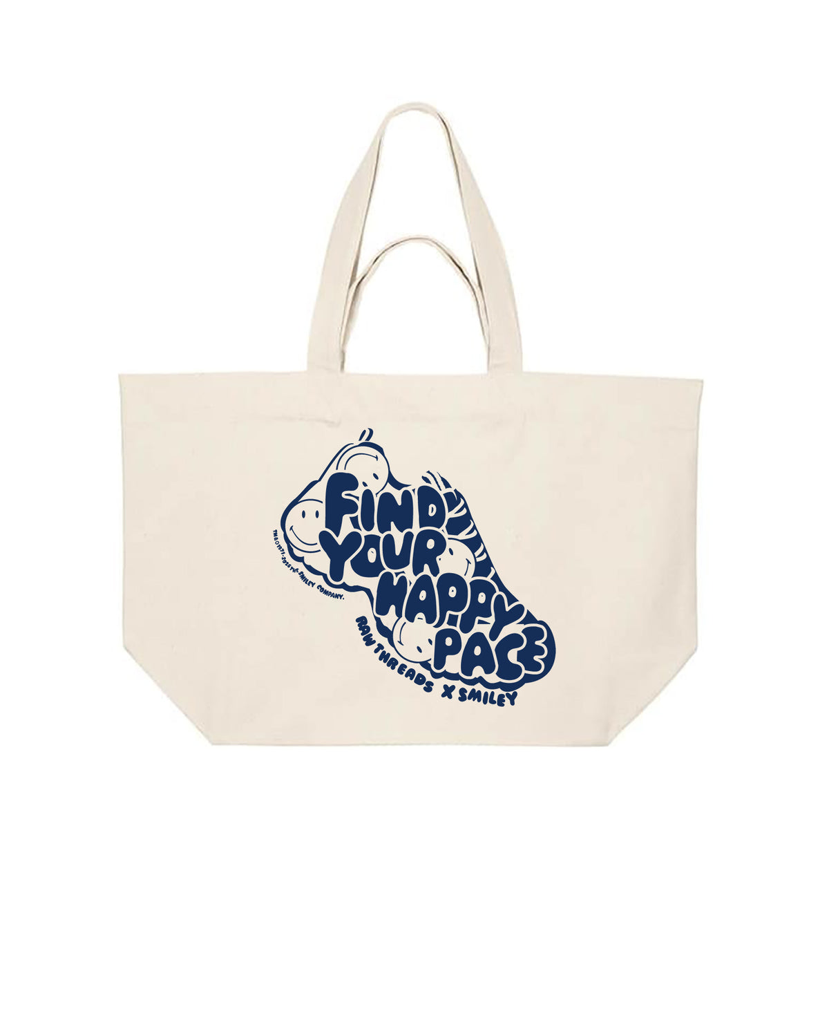A natural oversized canvas tote bag with a blue graphic of a running shoe and the text 'FIND YOUR HAPPY PACE' and 'RAW THREADS X SMILEY' logos.