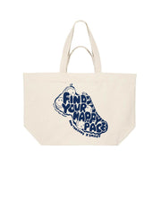 A natural oversized canvas tote bag with a blue graphic of a running shoe and the text 'FIND YOUR HAPPY PACE' and 'RAW THREADS X SMILEY' logos.